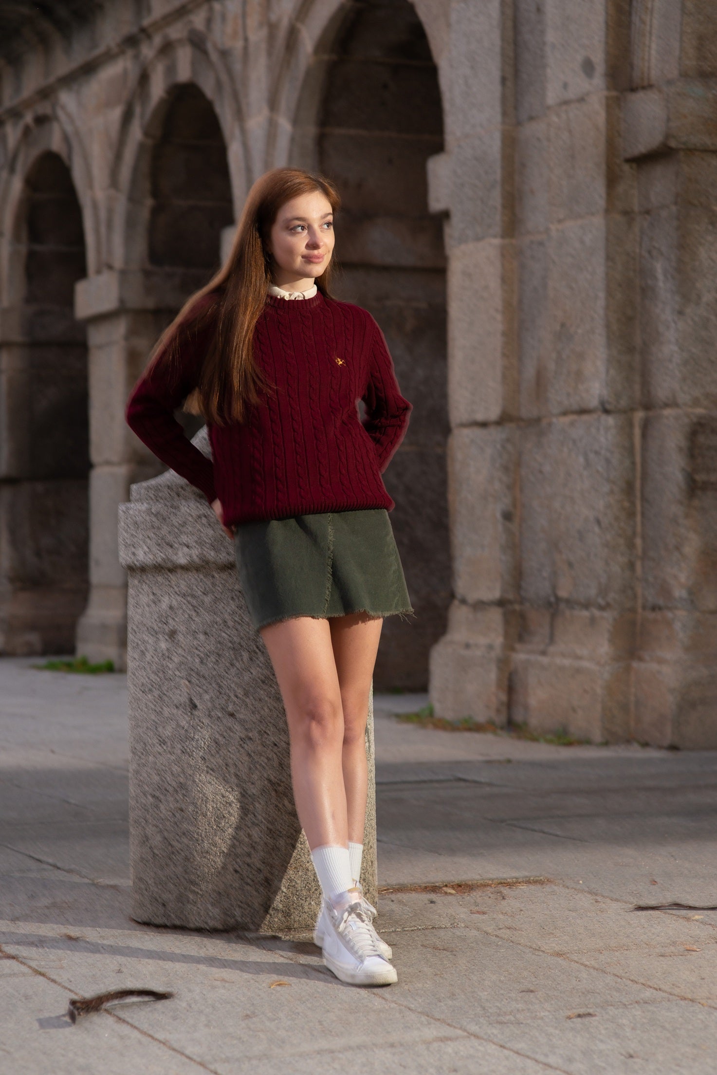 Cable knit sweater with heathered lining at the neck
