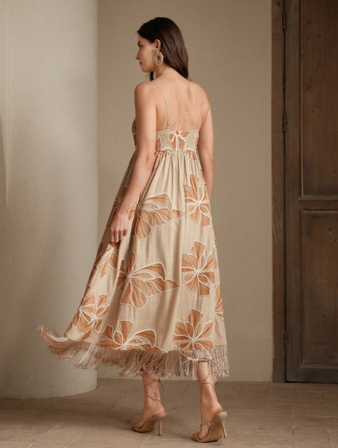 Long apricot dress with rope embroidery and fringes