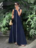 Long tent-cut dress with jewel neckline and white embroidery