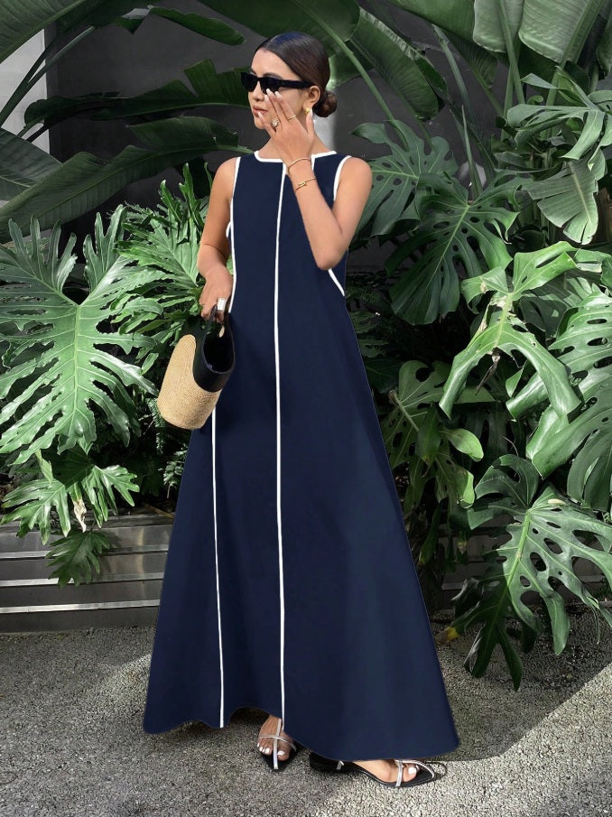 Long tent-cut dress with jewel neckline and white embroidery