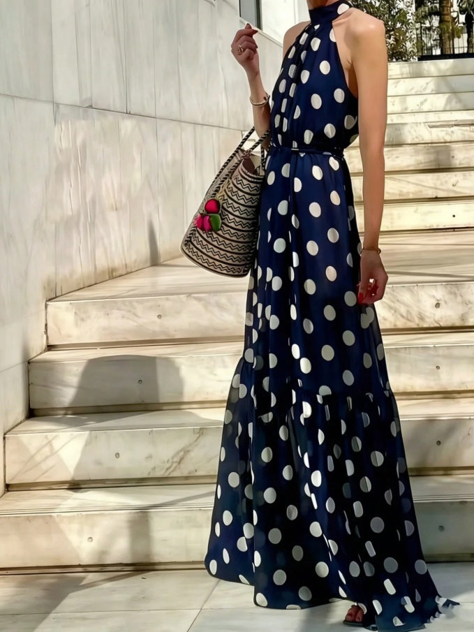Long navy blue polka dot dress with apron neck