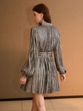 Metallic style blouson dress with long sleeves